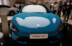 A Chinese smartphone maker is breaking into EVs and challenging Tesla. How the stock rates now. A Chinese smartphone maker is breaking into EVs and challenging Tesla. How the stock rates now.