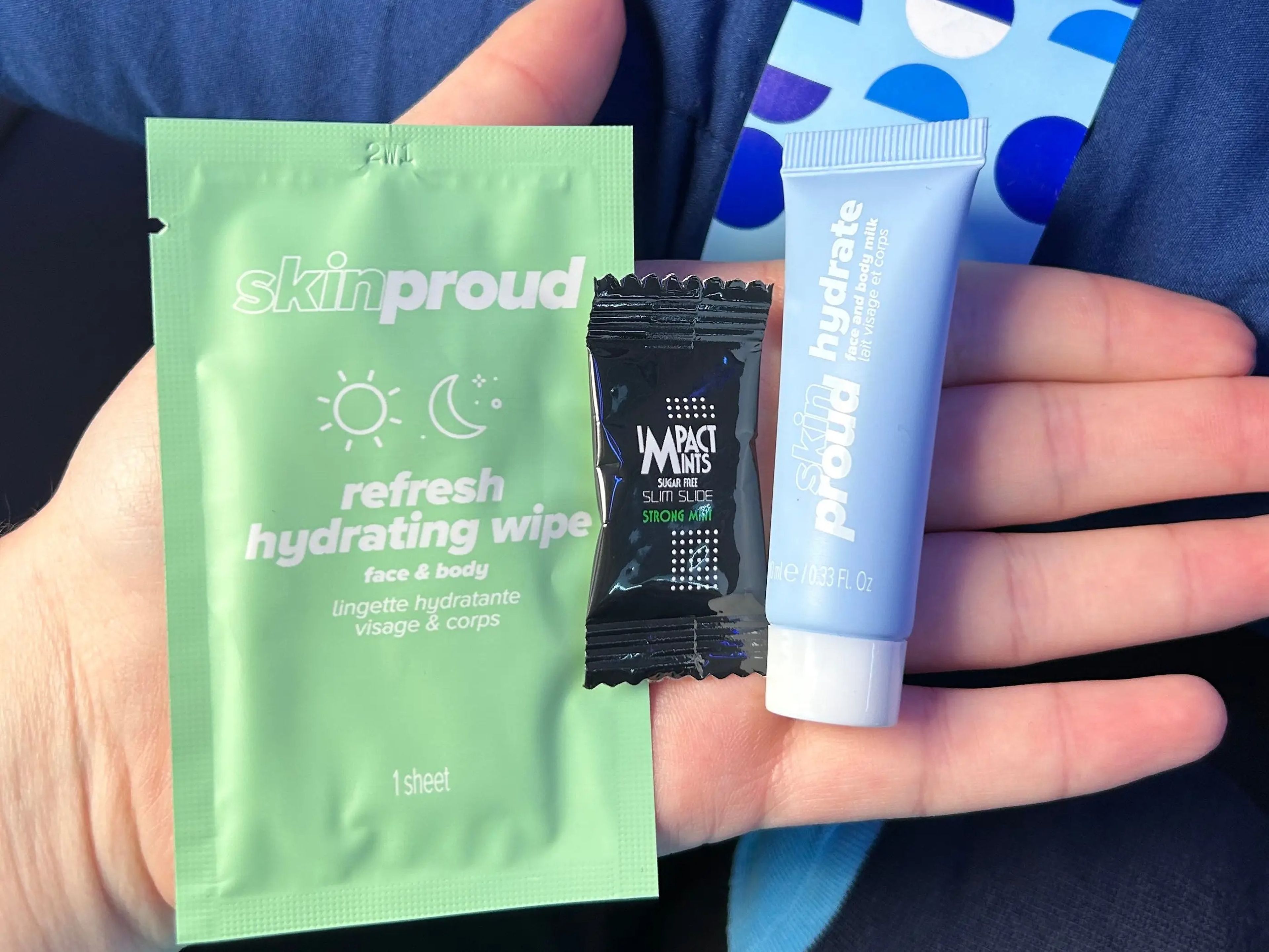 A face towelette, lotion, and a mint.