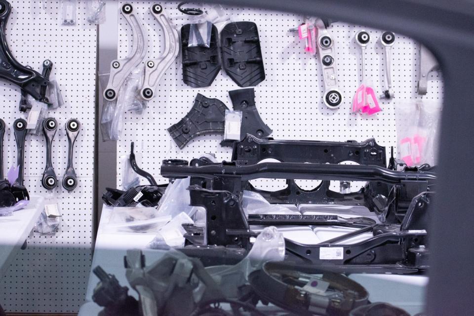 At the Caresoft facility, engineers tear down every piece of a vehicle to examine how it is assembled and determine costs. Thousands of components are laid out on tables or affixed to wall displays.